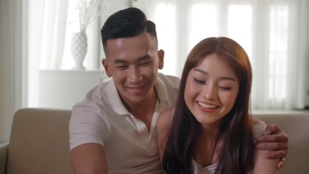 Medium Shot Young Asian Couple Hugging Drinking Tea — Stock Video