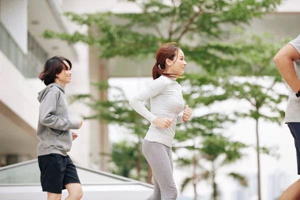Pretty Fit Young Asian Woman Comfy Sports Clothes Jogging Outdoors — Stock Photo, Image