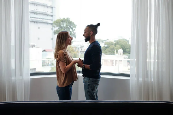 Happy Mixed Race Couple Love Standing Balcony Holding Hands Looking — Stock Photo, Image