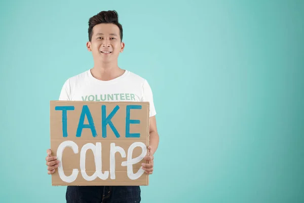 Hübsche Junge Asiatische Freiwillige Halten Ein Pappschild Mit Der Aufschrift — Stockfoto