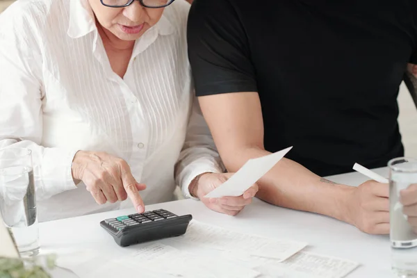 Mature Woman Checking Bills Receipts Calculating Expenses Sitting Next Adult — Stock Photo, Image