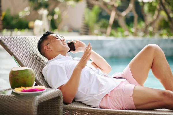 Cheerful Mature Man Sunbathing Swimming Spa Hotel Talking Phone Friend — Stock Photo, Image