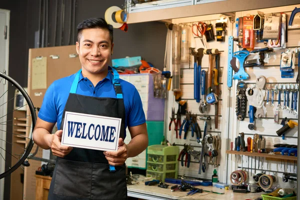 Mechanic Welcoming Customers — стоковое фото