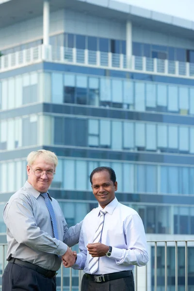 Diverse Business Partners Shaking Hands — Stock Photo, Image