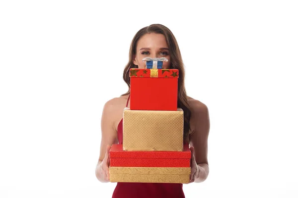 Mujer sosteniendo cajas de regalo rojas y doradas —  Fotos de Stock