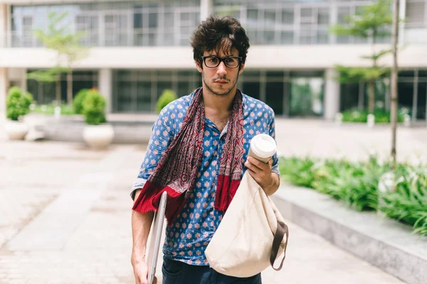 Student with bag and laptop