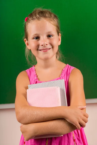 Smiling schoolgirl — Stock Photo, Image