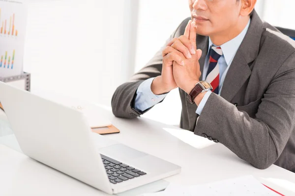 Businessman sitting on front of the laptop — Stock Photo, Image