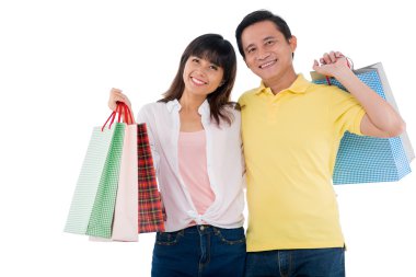 neşeli bir aile ile kağıt torbalar