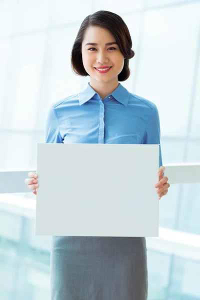 Manager holding empty white board — Stock Photo, Image