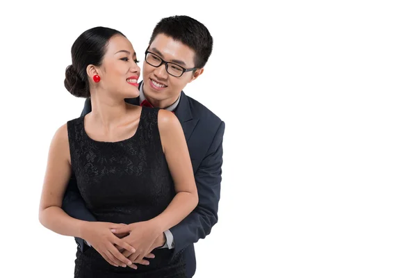 Vietnamese man embracing his girlfriend — Stock Photo, Image