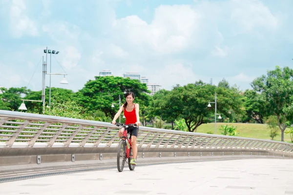 Girl riding on bike — Stock Photo, Image