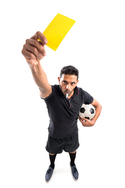 Football referee showing yellow card