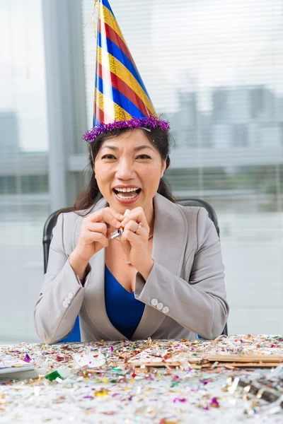 Business woman in party hat — Stock Photo, Image