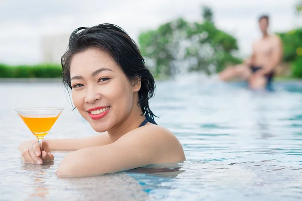 Cheerful girl with a cocktail — Stock Photo, Image