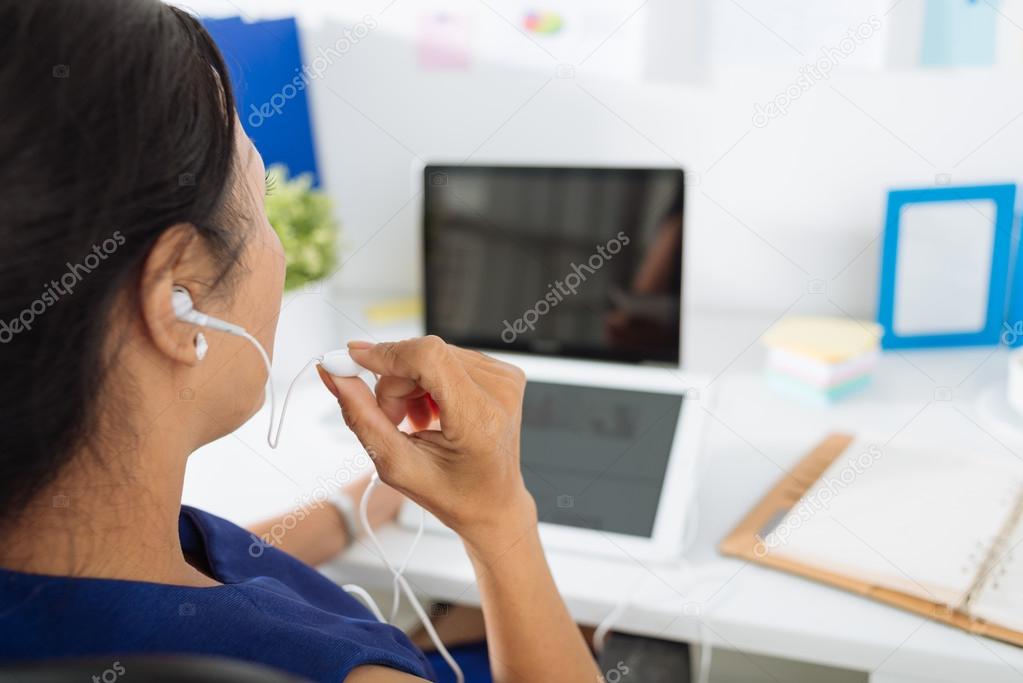 Female manager using digital tablet