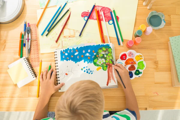 Boy painting with gouache — Stock Photo, Image