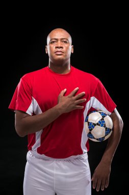Soccer player listening to anthem clipart