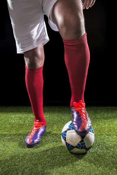Legs of footballer — Stock Photo, Image