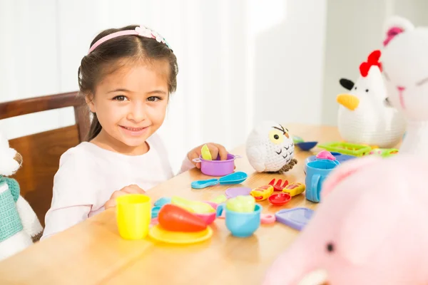 Girl with toys — Stock Photo, Image