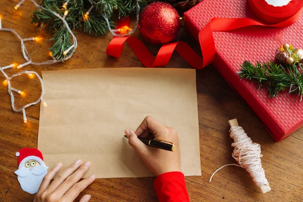 Writing Christmas greetings — Stock Photo, Image