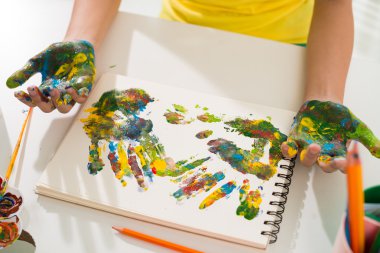 Multicolored hand prints clipart