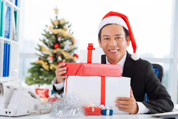 Businessman with s  gifts — Stock Photo, Image