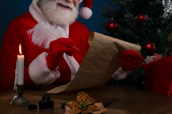 Santa Writing list of names — Stock Photo, Image