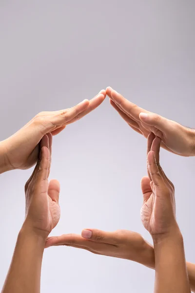 Forming shape of house — Stock Photo, Image