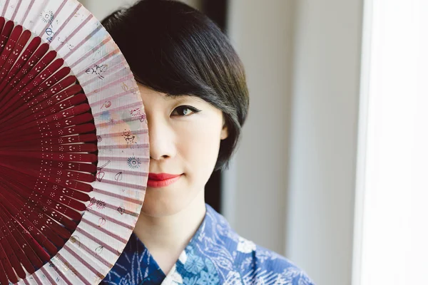 Behind fan — Stock Photo, Image