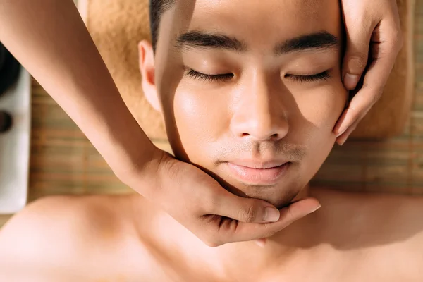 Enjoying facial massage — Stock Photo, Image