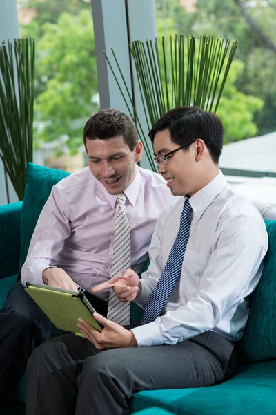 Managers with digital tablet — Stock Photo, Image