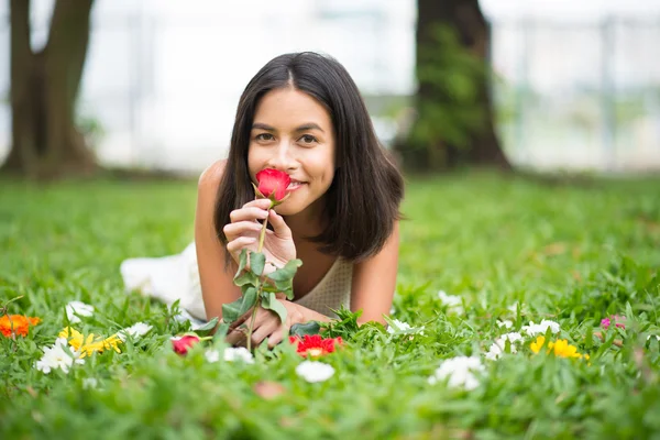 Enjoying  smell of rose — Stock Photo, Image