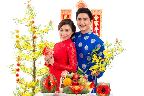 Vietnamese couple at the holiday table — Stock Photo, Image