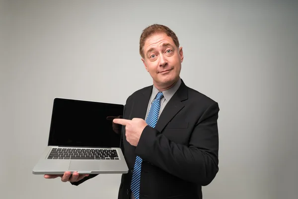 Businessman with a laptop — Stock Photo, Image