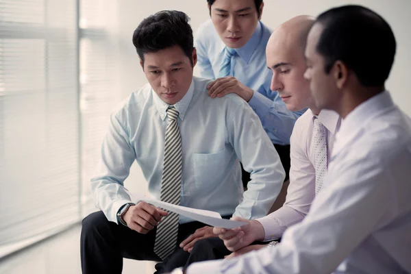 Serious multi-ethnic business team — Stock Photo, Image