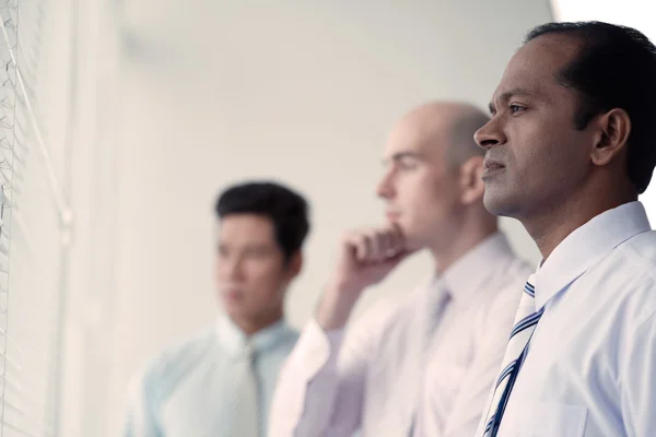 Contemplating business people — Stock Photo, Image