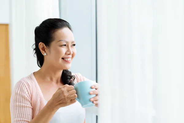 Smiling mature Asian woman — Stock Photo, Image