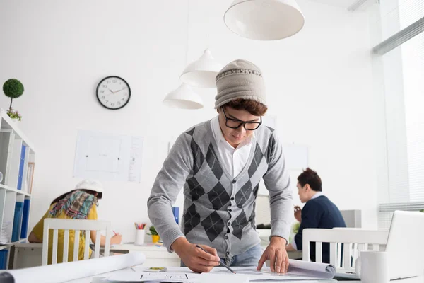 Architect making draft in the office — Stock Photo, Image