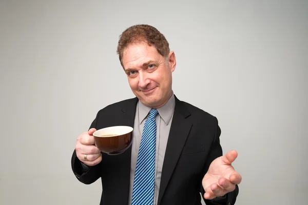 Mature manager with a cup — Stock Photo, Image
