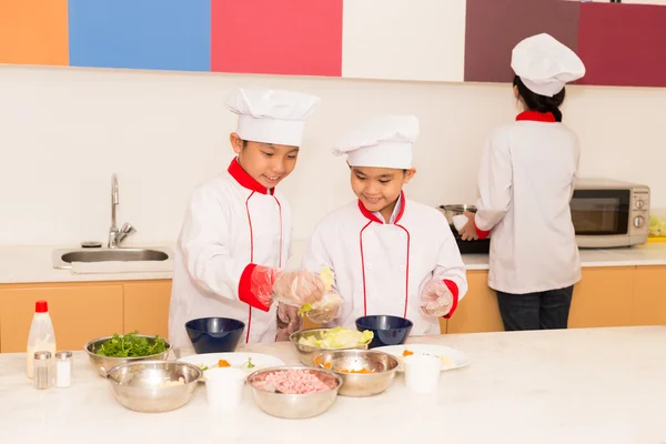 Kids  cooking in the kitchen — Stock Photo, Image