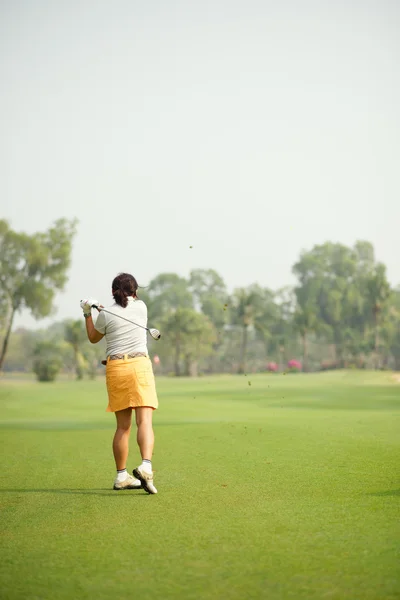 Hitting ball with a club — Stock Photo, Image