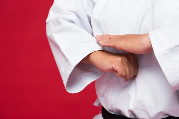 Sportswoman practicing karate — Stock Photo, Image