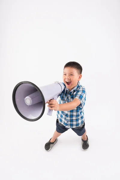 Boy shouting into megaphone — Stock Photo, Image