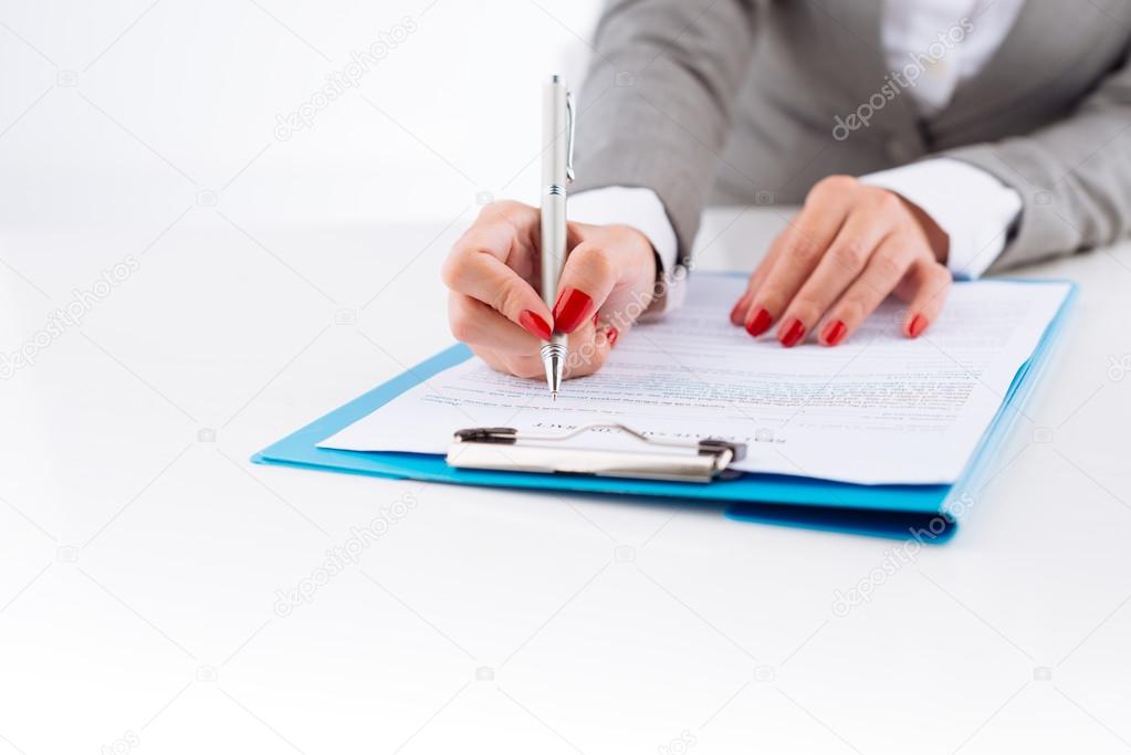 business lady examining document