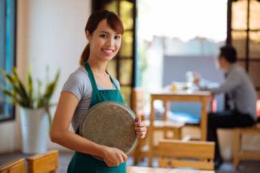 Beautiful waitress with a tray clipart