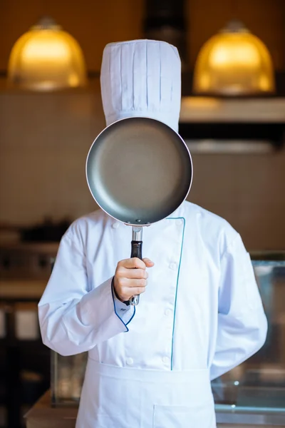 Cook hiding face — Stock Photo, Image