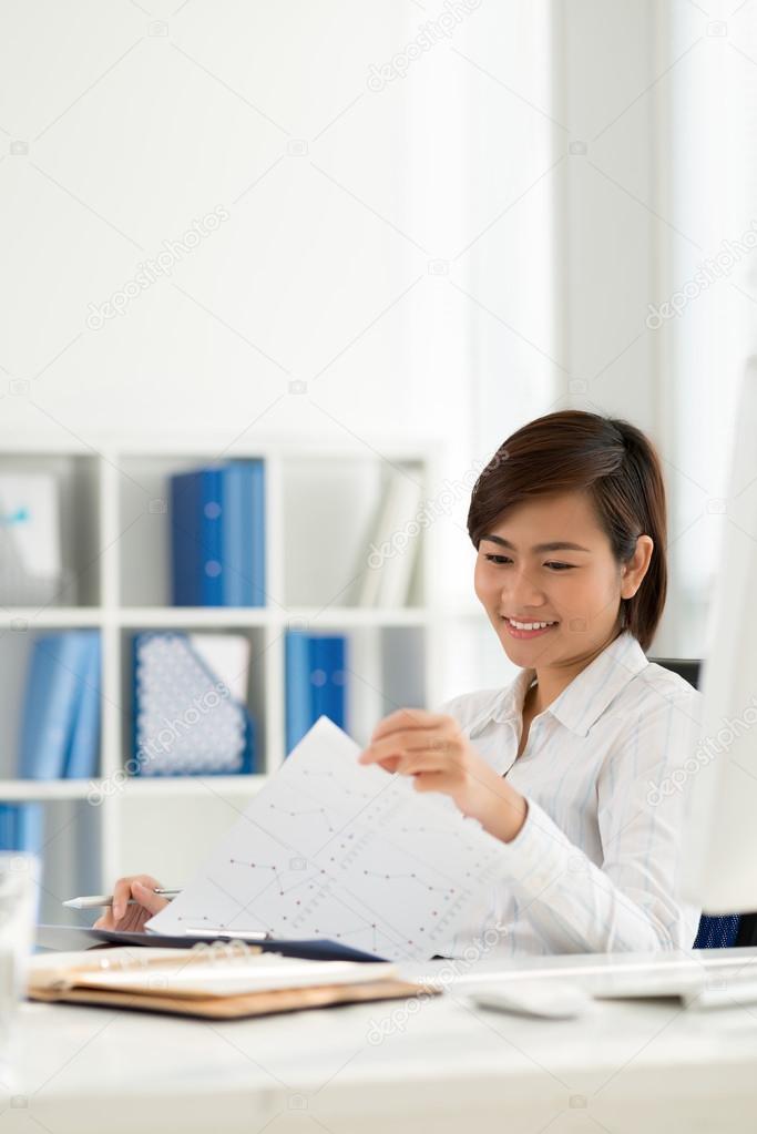 Business lady working with papers