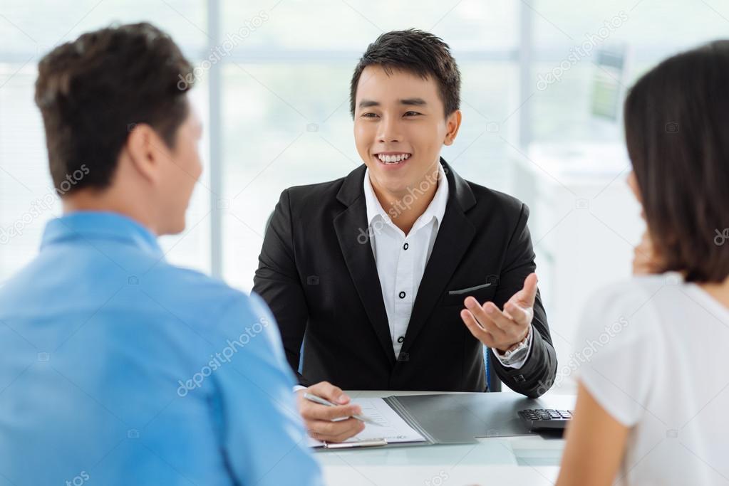 sales manager giving advice to clients