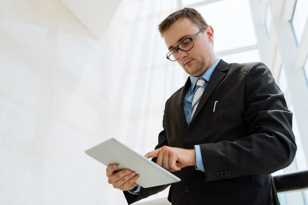 Financial manager with digital tablet